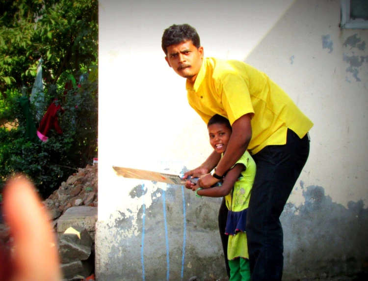 Vinayak Mali working with children