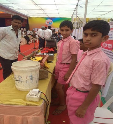 Ishan with his flood indicator project